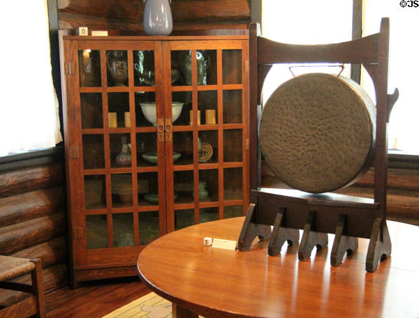 Arts & Crafts dinner gong (c1900-04) & oak corner cabinet (c1910-11) by Craftsman Workshops of Eastwood, NY at Stickley Museum at Craftsman Farms. Morris Plains, NJ.