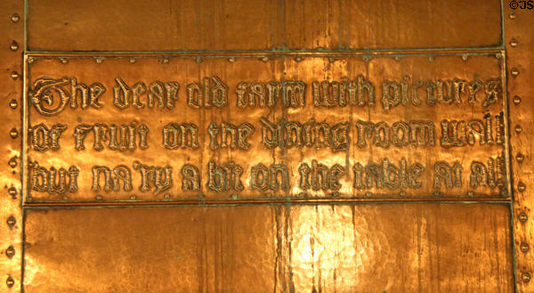 Dining room fireplace copper repousse slogan 'The dear old farm with pictures of fruit on the dining room wall but na'ry a bit on the table at all.' at Craftsman Farms. Morris Plains, NJ.