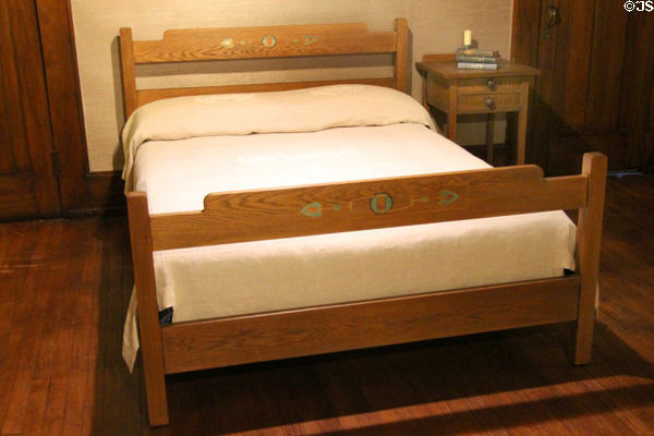 Oak double bed with inlay (c1906-11) by Craftsman Workshops of Eastwood, NY at Gustav Stickley Museum at Craftsman Farms. Morris Plains, NJ.