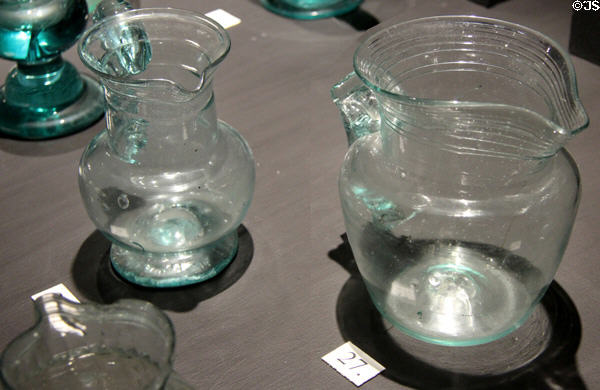 Green glass pitchers (early 19thC) prob. from South Jersey at Museum of American Glass. Milville, NJ.