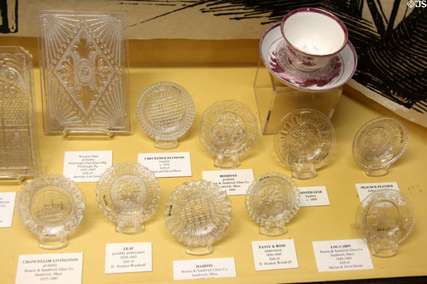 American pressed glass cup plates (early 1800s) used hold tea cups after tea was poured into saucers to cool at Museum of American Glass. Milville, NJ.
