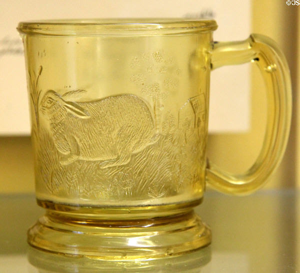 Pressed glass rabbit mug (1870-85) by Central Glass Co. of Wheeling, WV at Museum of American Glass. Milville, NJ.