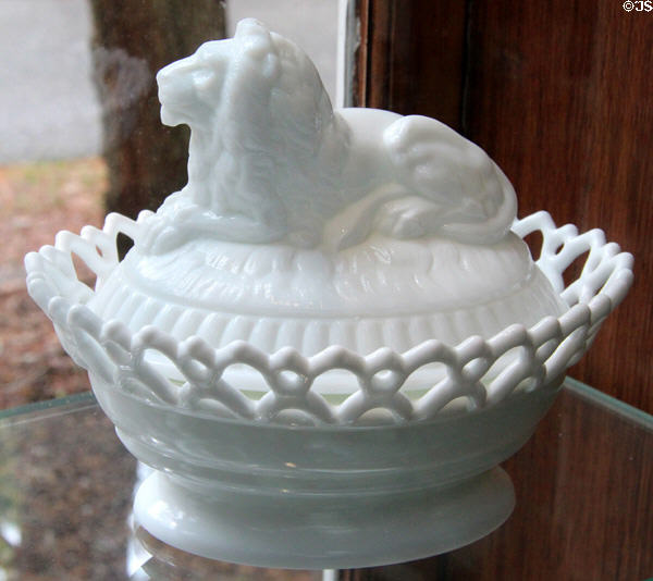 Pressed milk glass lion dish (c1889) by Atterbury & Co. of Pittsburgh, PA at Museum of American Glass. Milville, NJ.