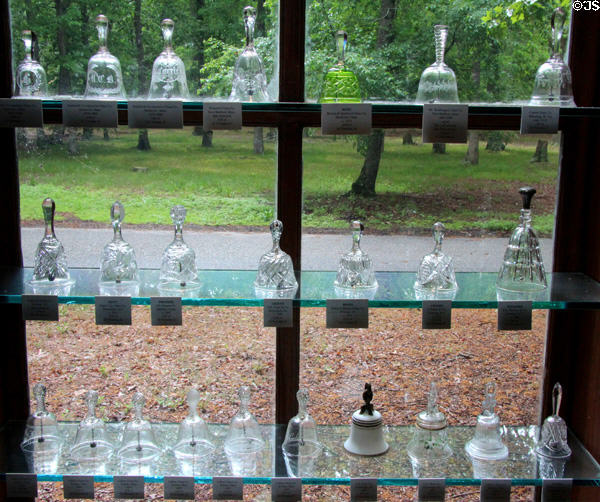 Collection of American cut glass dinner table bells used to summon staff at Museum of American Glass. Milville, NJ.