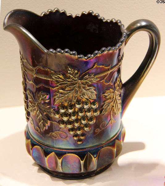 Carnival Glass purple grape & cable pitcher by Northwood Glass Co. at Museum of American Glass. Milville, NJ.