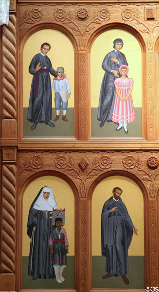 Reredos (1986) of St. Francis Cathedral with saints by Robert Lentz of the New World. Santa Fe, NM.