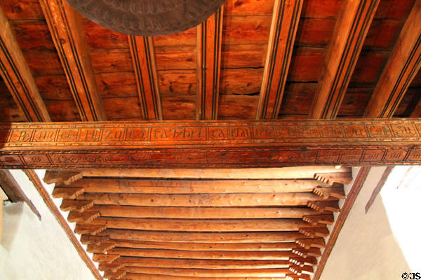 Ceiling beams (1710) span adobe walls of San Miguel Mission church. Santa Fe, NM.
