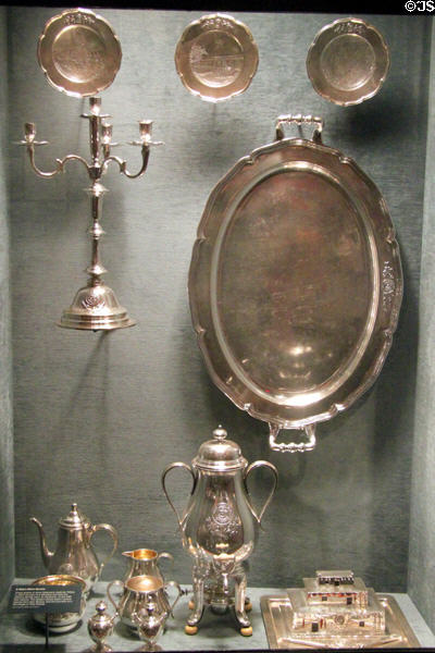 USS New Mexico ship's silver service (1917) with scenes of the state at New Mexico History Museum. Santa Fe, NM.
