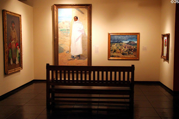 Overview of gallery of paintings at New Mexico Museum of Art. Santa Fe, NM.