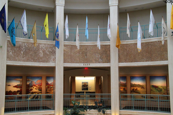 Circular interior balconies with part of Capitol Art Collection in rotunda of New Mexico State Capitol. Santa Fe, NM.