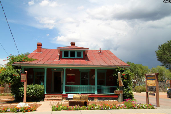 Gallery at 403 Canyon Road in heritage hip-roof house. Santa Fe, NM.