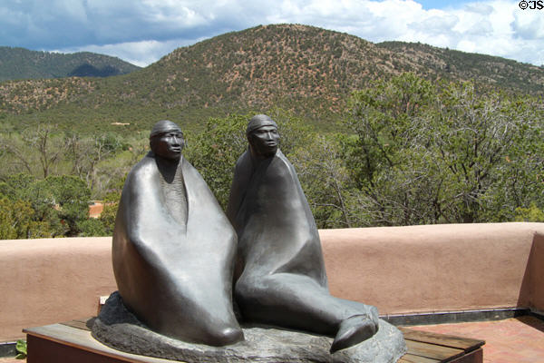 Dineh sculpture (1981) by Allan Houser against surrounding hills at Wheelwright Museum of the American Indian. Santa Fe, NM.