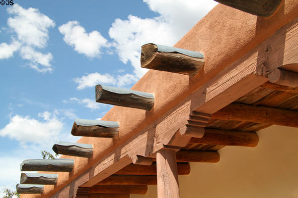 Wooden beams support roof on adobe structure of Museum of Spanish Colonial Art. Santa Fe, NM.
