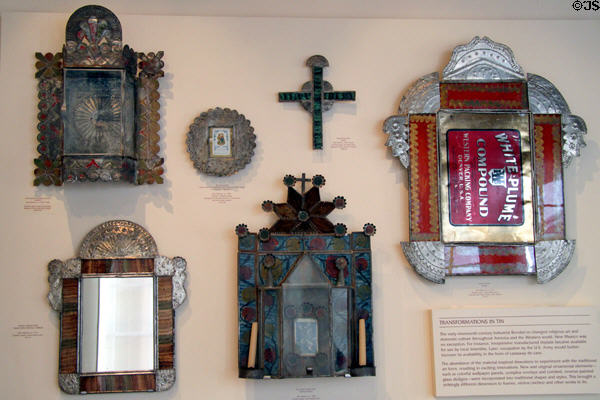 Tin frames & objects (1870s-1930s) often made by artisans from discarded cans of U.S. troops at Museum of Spanish Colonial Art. Santa Fe, NM.