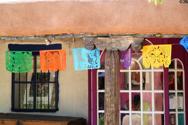 Hispanic cut-paper hangings (papel picado) in Old Town. Albuquerque, NM.