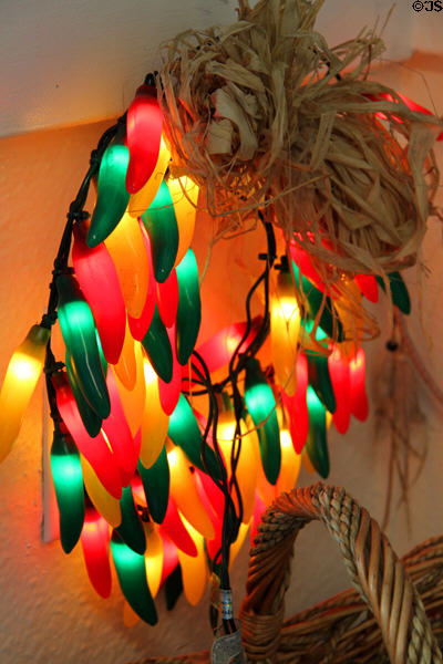 Wreath of chili pepper lights in shop off Old Town Square. Albuquerque, NM.
