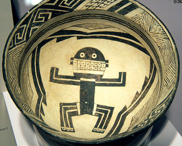 Mimbres classic black-on-white pottery bowl with man (c1000-1150) at Maxwell Museum of Anthropology. Albuquerque, NM.
