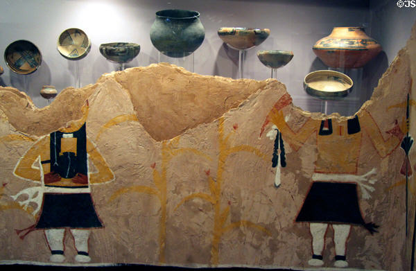 Reproduced Kuaua Wall Mural (c1400-1550) from Bernalillo, NM plus Rio Grande glazed pottery vessels from time period at Maxwell Museum of Anthropology. Albuquerque, NM.