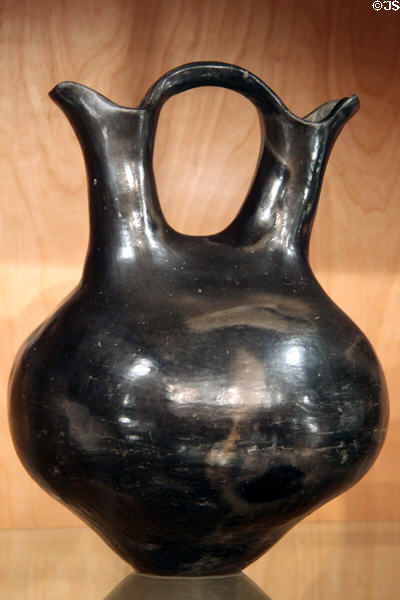 Stone polished native black wedding jar (1910) from Ohkay Owingeh, NM at Maxwell Museum of Anthropology. Albuquerque, NM.