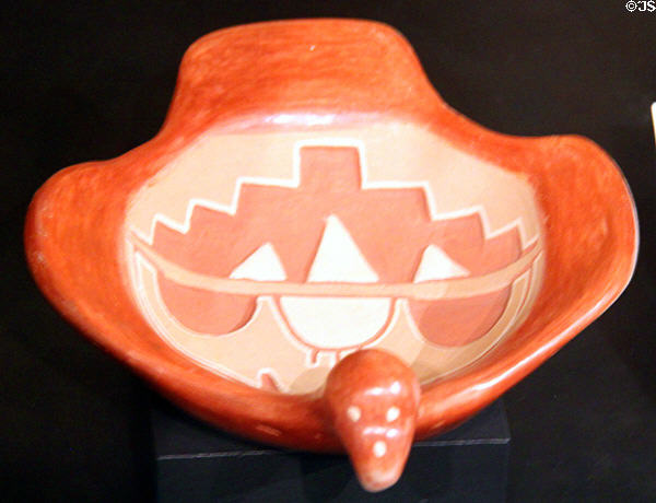 Carved polychrome native pottery bowl (1942) with lightning cloud, rain & bird shape from Ohkay Owingeh, NM at Maxwell Museum of Anthropology. Albuquerque, NM.
