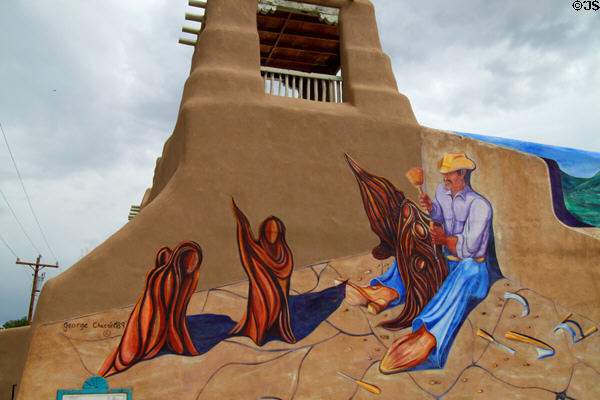 El Santero mural by George Chacon celebrates the Santeros artists who created a culturally important part of New Mexico's heritage. Taos, NM.