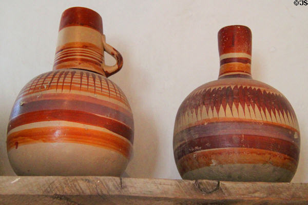 Pottery jugs in kitchen in Kit Carson Home. Taos, NM.
