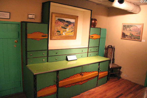 Custom cabinets with painted design at Blumenschein Home & Museum. Taos, NM.