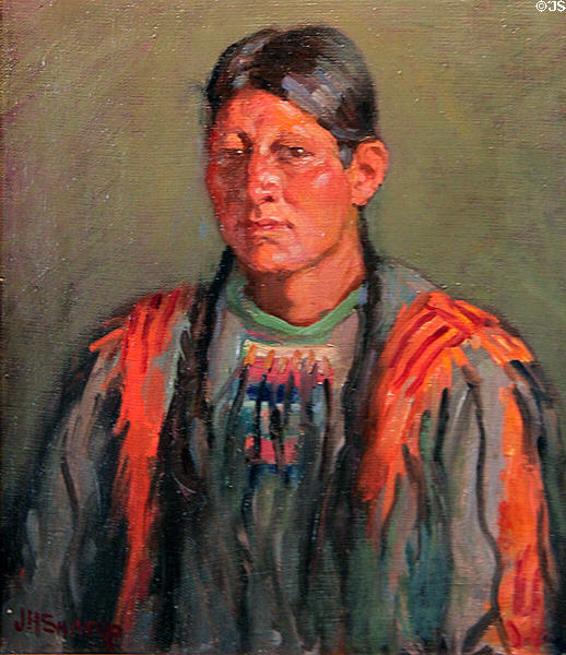 Jerry Mirabal, Taos in Sioux War Shirt painting (1914) by Joseph Henry Sharp at Blumenschein Home & Museum. Taos, NM.