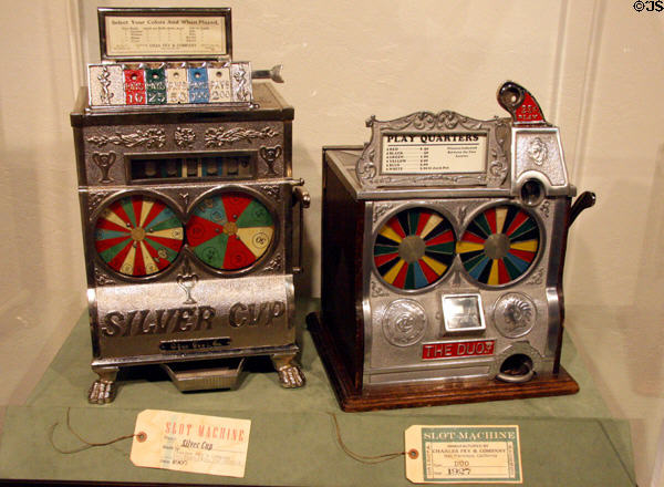 Silver Cup (1907) & Duo (1927) by Fey spinning flat wheel slot machines at Nevada State Museum. Carson City, NV.