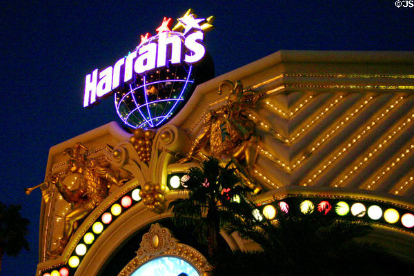 Harrah's Las Vegas Hotel & Casino sign at night. Las Vegas, NV.
