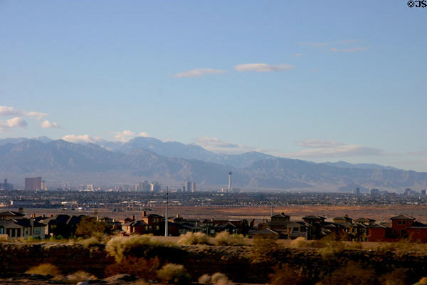 Skyline of Las Vegas against mountain backdrop from southeast of city. Las Vegas, NV.