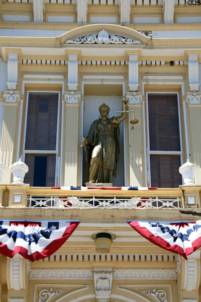 Statue with scales of justice without blindfold on Storey County Courthouse (1876). Virginia City, NV.