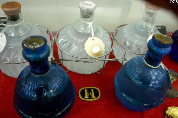 Glass hand grenade fire extinguishers (c1860) at FASNY Museum of Firefighting. Hudson, NY.