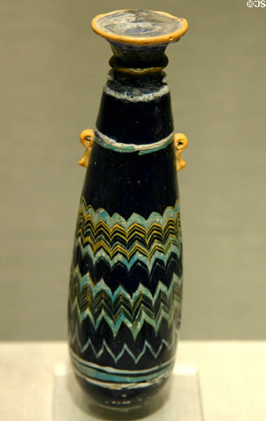 Glass perfume bottle from Eastern Mediterranean possibly Rhodes (6th-5thC BCE) at Corning Museum of Glass. Corning, NY.