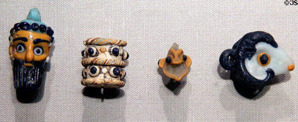Glass pendants from Carthage or Lebanon (600-250 BCE) at Corning Museum of Glass. Corning, NY.