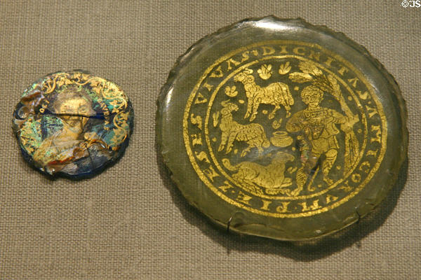 Roman glass gilded medallions with portrait (3rd C) & shepherd scene (4thC) at Corning Museum of Glass. Corning, NY.
