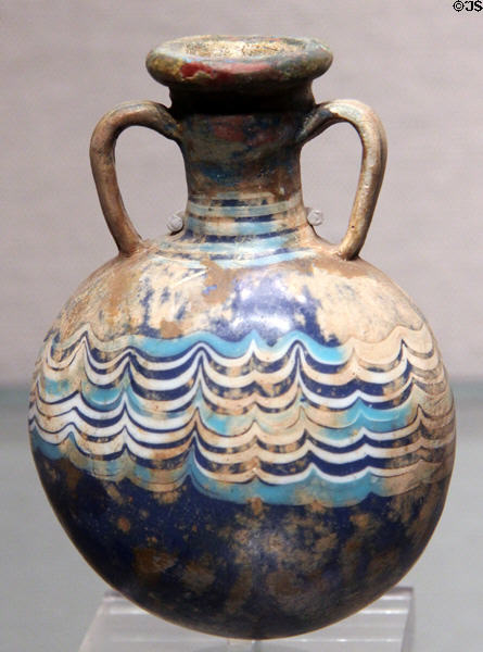 Egyptian glass lens-shaped flask (1400-1360 BCE - late 18th Dynasty) at Corning Museum of Glass. Corning, NY.
