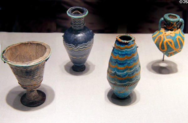 Egyptian glass goblet & bottles (1460-1225 BCE - 18-19th Dynasties) at Corning Museum of Glass. Corning, NY.