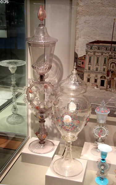 Venetian glass (l-r) covered goblet supported on ring of glass flowers (1864), Pokal with medallions depicting the Four Seasons (c1881), & 2 small covered goblets (c1875 & 8) at Corning Museum of Glass. Corning, NY.