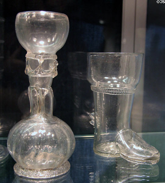 Germanic trick glass (17th C) & glass drinking boot (c1650-1700) at Corning Museum of Glass. Corning, NY.
