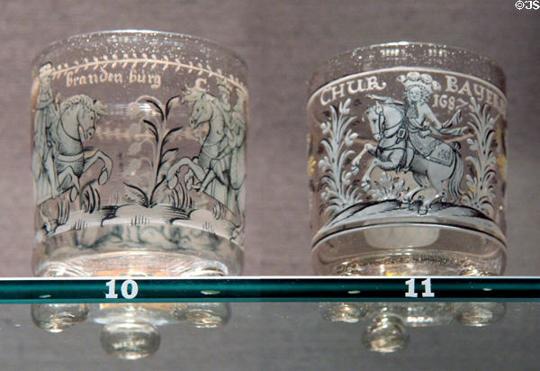 Central German beakers on ball feet (1675 & 87) with engravings of Brandenburg & Bavarian electors at Corning Museum of Glass. Corning, NY.
