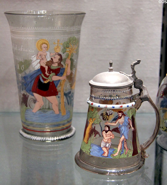 Bohemian or German glass beaker with St. Christopher (1659) & covered tankard with Baptism of Christ (c1600-25) at Corning Museum of Glass. Corning, NY.