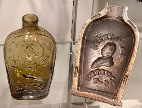 American glass liquor flask with image of Lafayette & metal mold in which it was blown (c1820s-30s) at Corning Museum of Glass. Corning, NY.