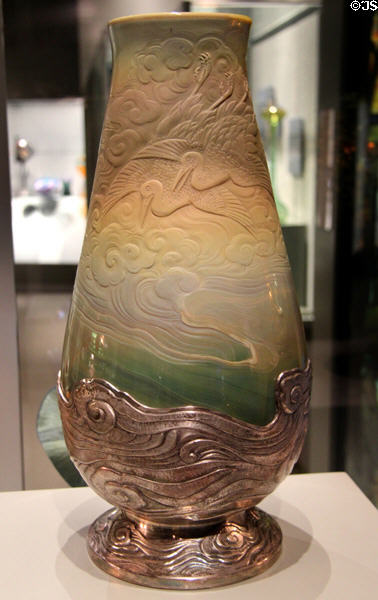Glass with silver mount Agate vase with cranes flying over sea (1898-1900) by Louis Tiffany at Corning Museum of Glass. Corning, NY.