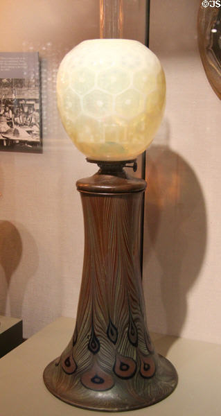 Kerosene lamp with glass peacock feather base (1895-1905) by Louis Comfort Tiffany at Corning Museum of Glass. Corning, NY.