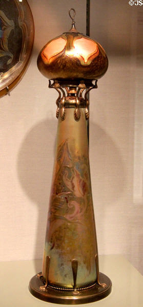Cypriote lamp (1895-1910) with glass by Louis Comfort Tiffany on ceramic base by Clément Massier at Corning Museum of Glass. Corning, NY.