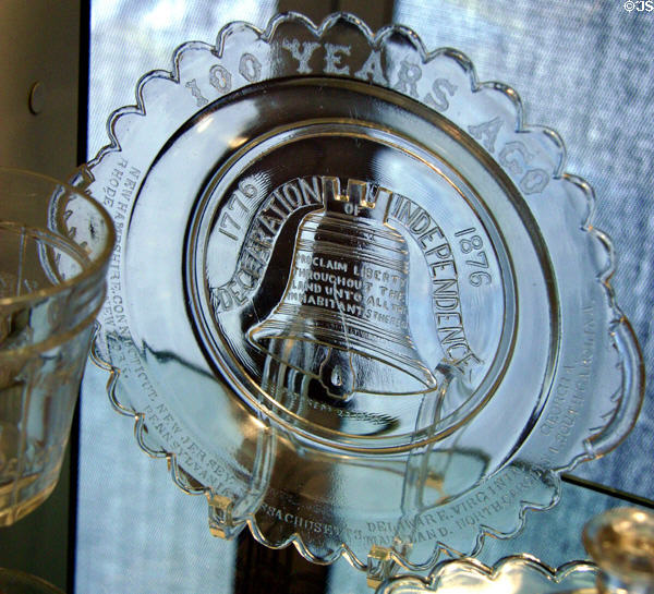Press glass plate with liberty bell for US 1876 Centennial by Adams & Co., Pittsburgh at Corning Museum of Glass. Corning, NY.