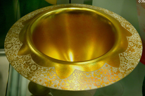 Steuben Gold Aurene glass bowl with white decoration at Corning Museum of Glass. Corning, NY.