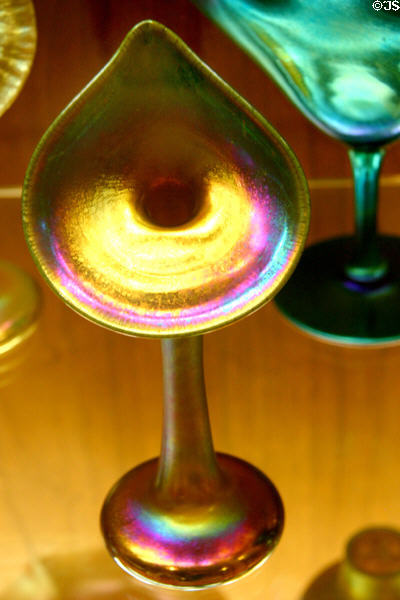 Steuben Gold Aurene glass lily vase with iridescence at Corning Museum of Glass. Corning, NY.