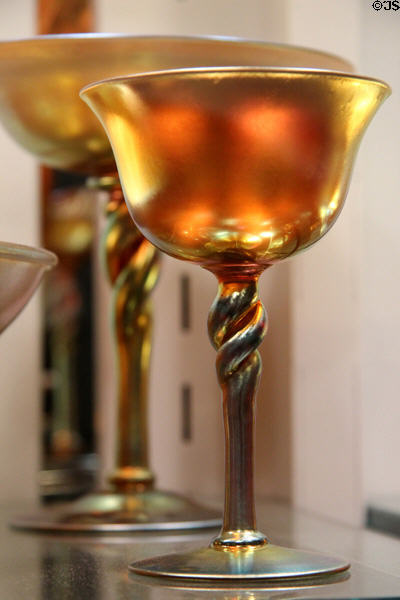 Gold Aurene glass twisted stem goblet (1904-30s) by Frederick Carder for Steuben Glass at Corning Museum of Glass. Corning, NY.